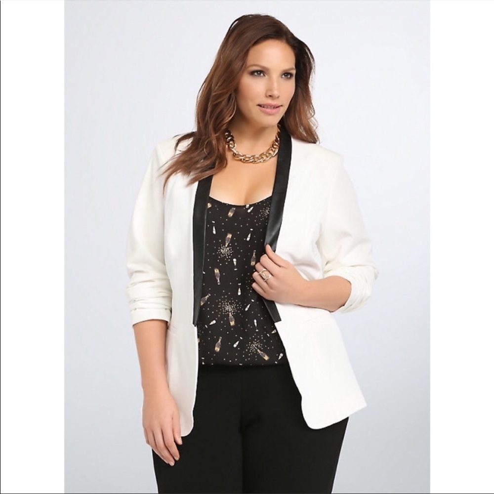 Torrid white faux leather trimmed open front tuxedo blazer.